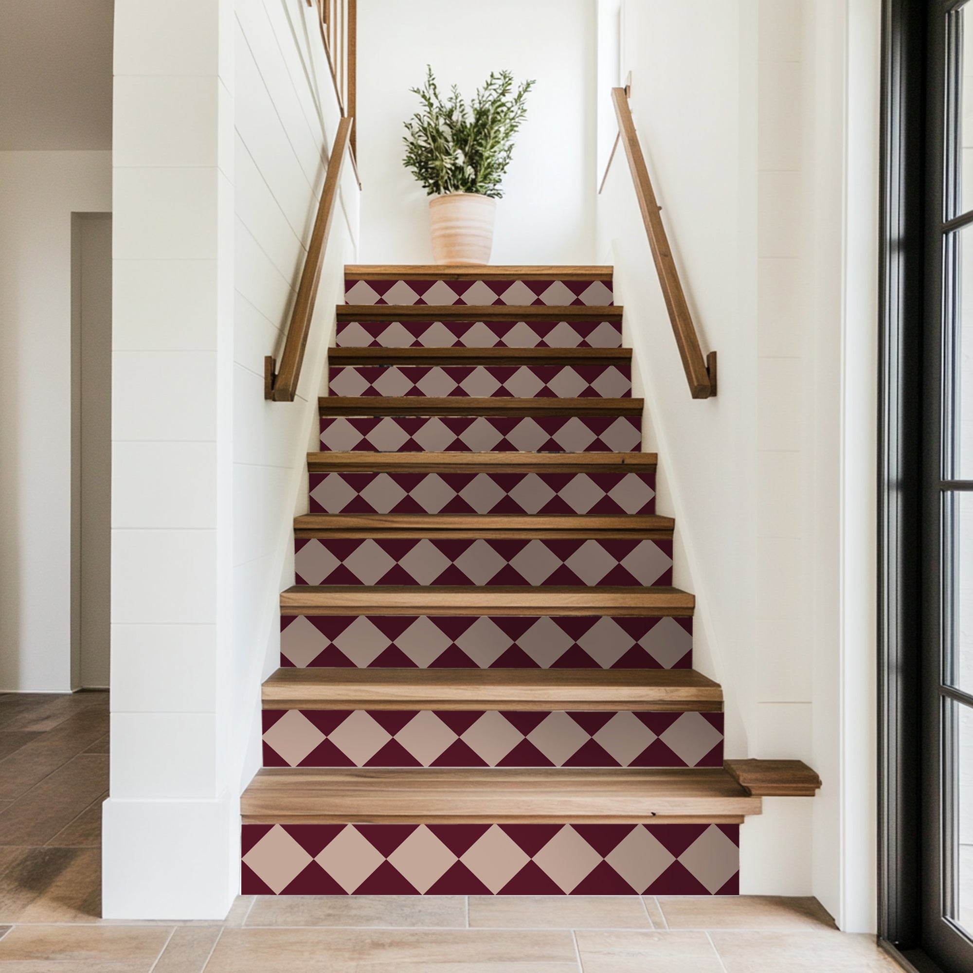 a stair case with a potted plant on top of it