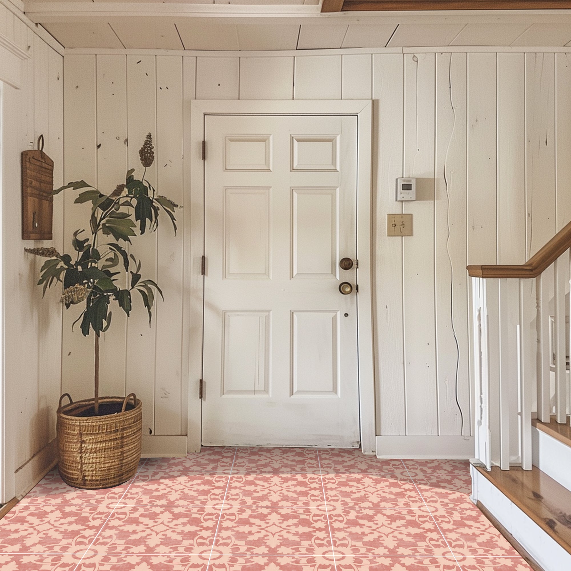 a white door with a plant in a basket next to it