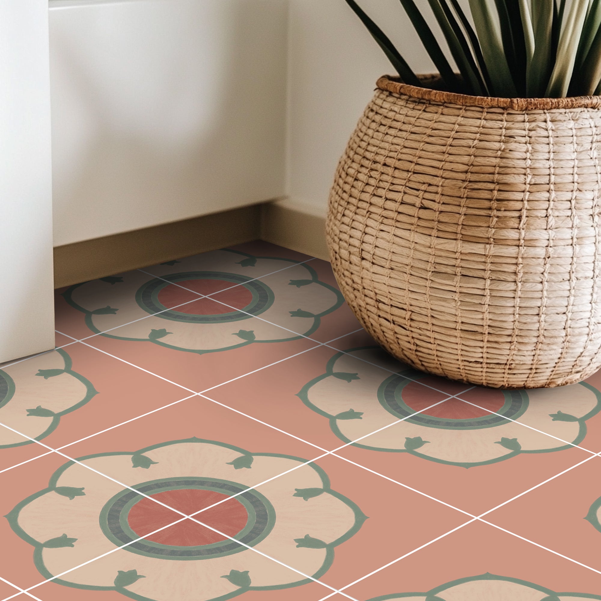 a potted plant sitting on top of a tiled floor