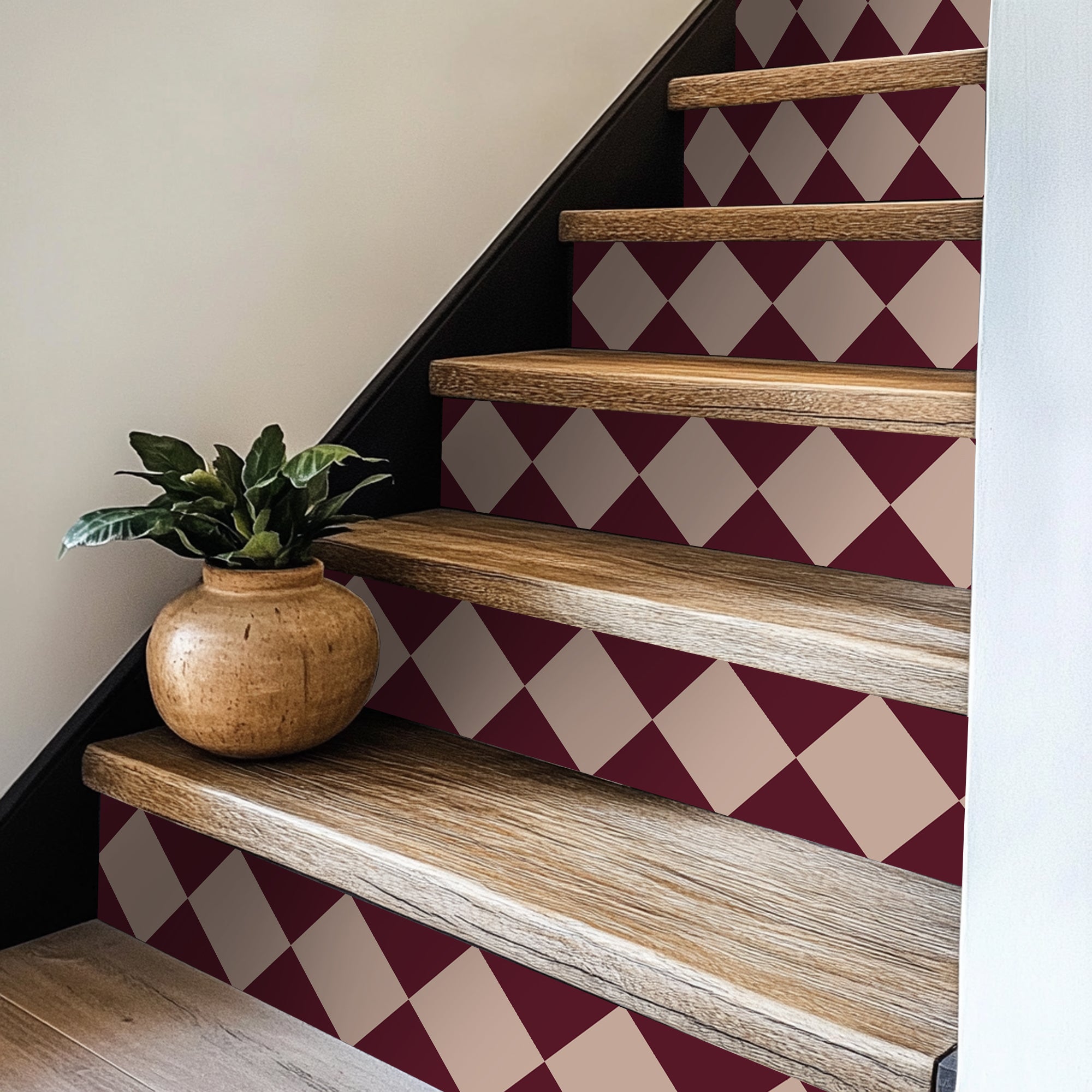 a potted plant sitting on top of a set of stairs