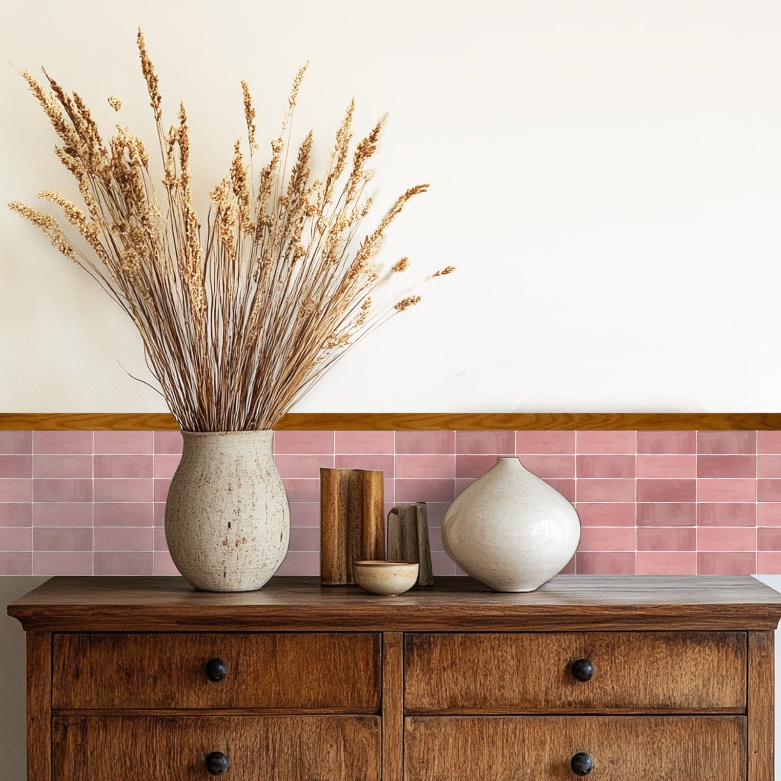 a wooden dresser topped with two vases and a plant