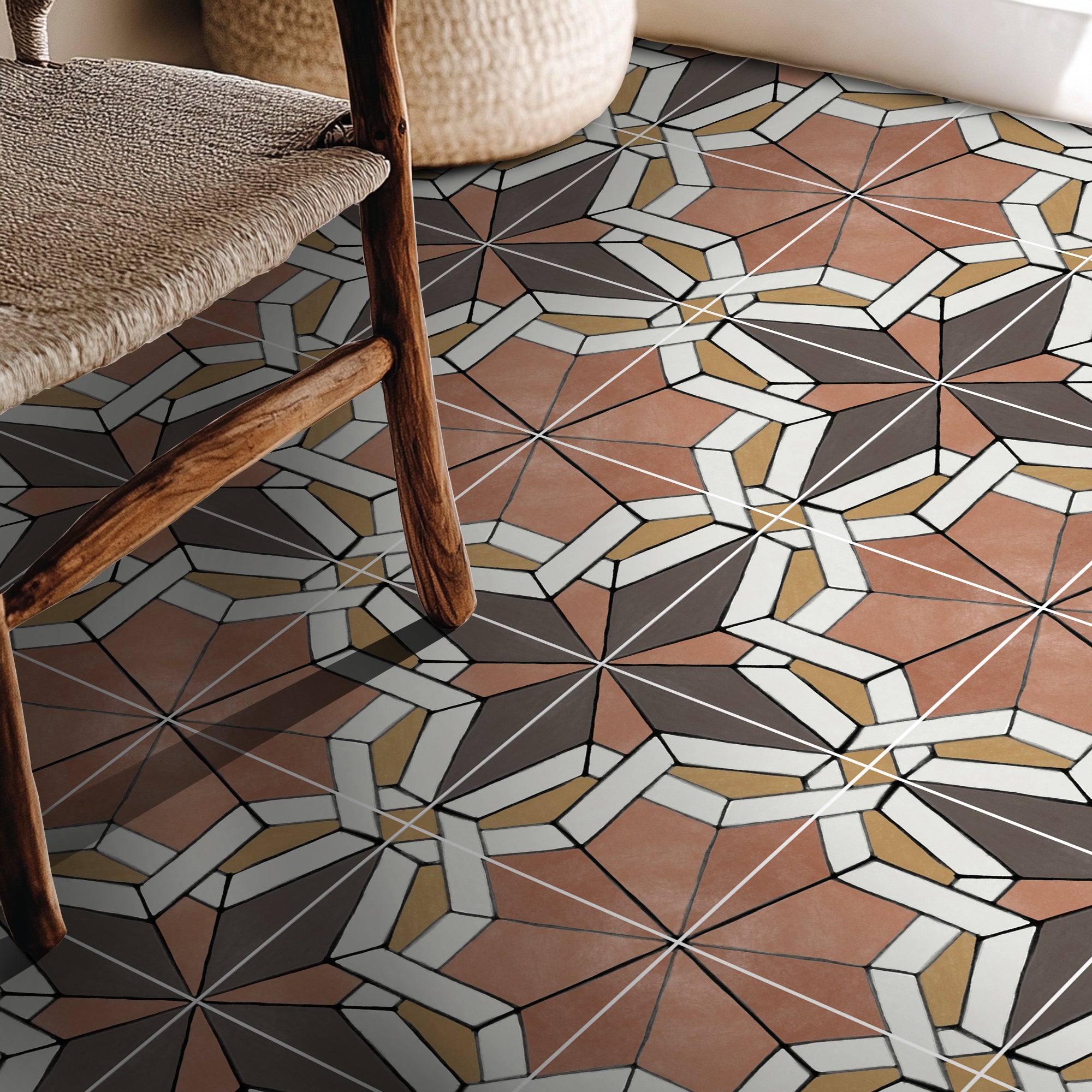 a wooden chair sitting on top of a tiled floor