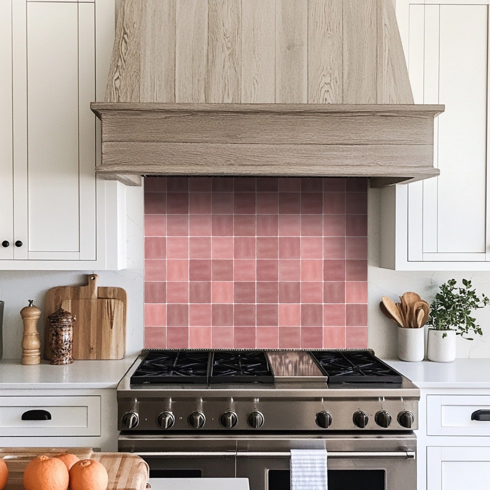 a stove top oven sitting inside of a kitchen