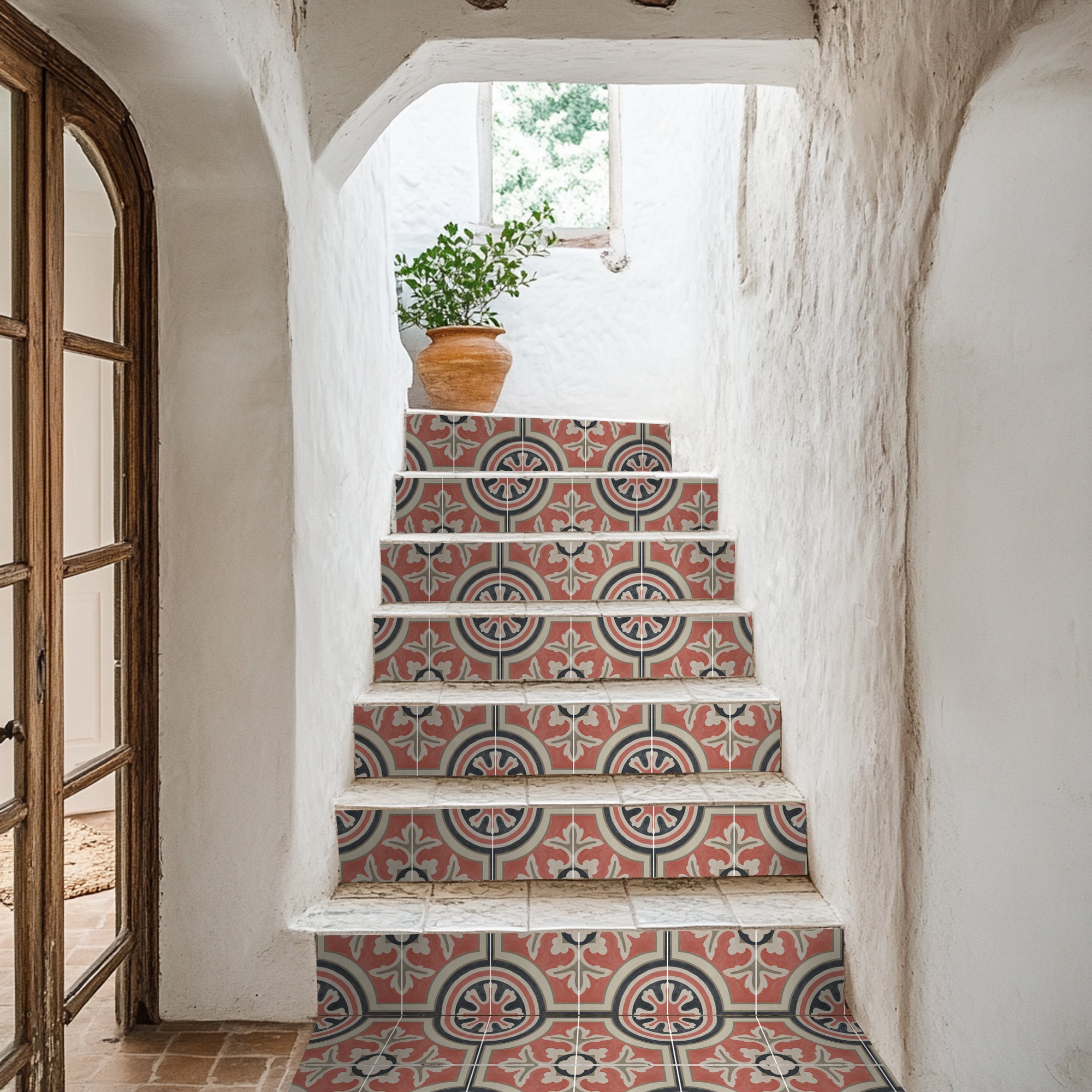 a stair case with a potted plant on top of it