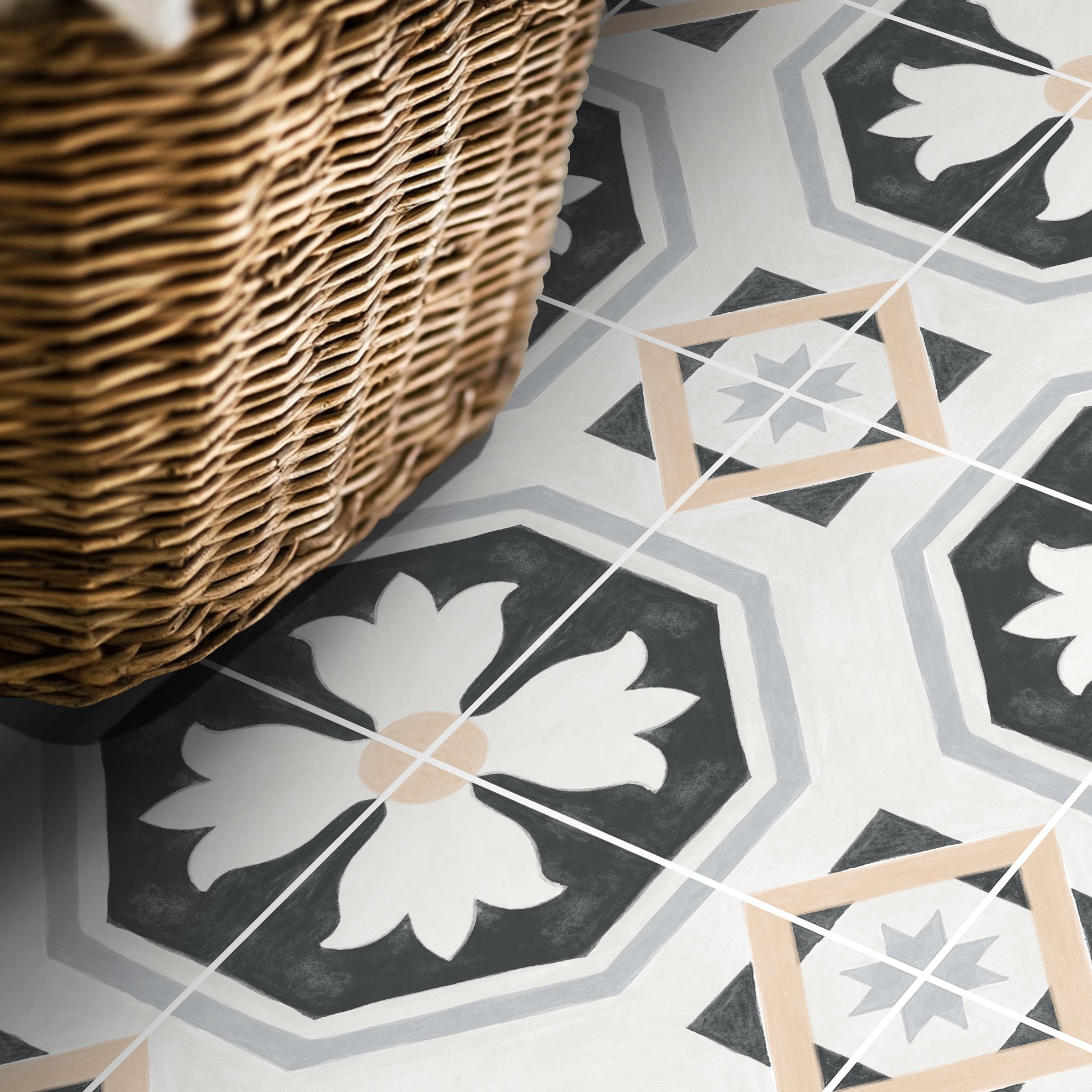 a basket sitting on top of a floor next to a wall