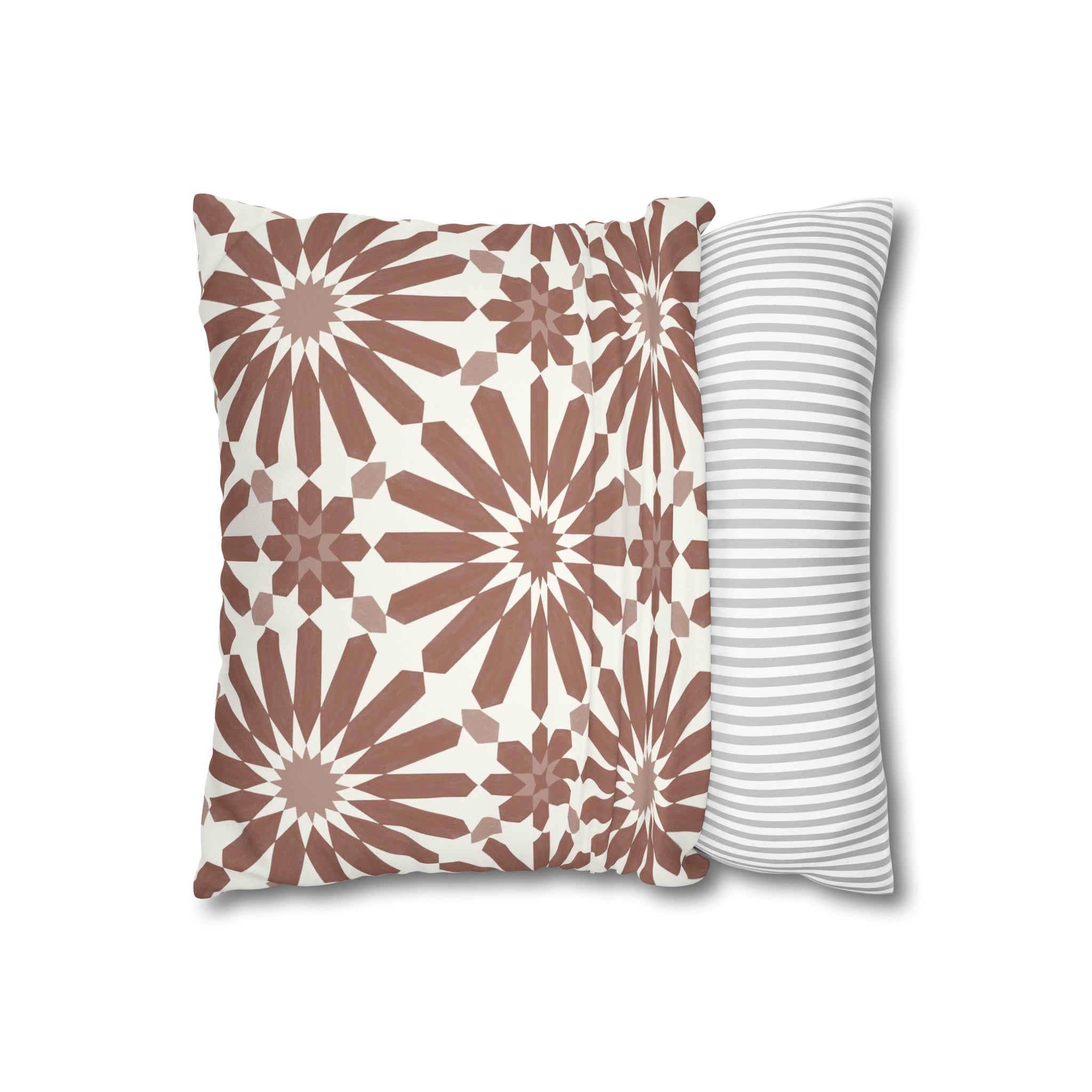 two pillows with a flower pattern on them