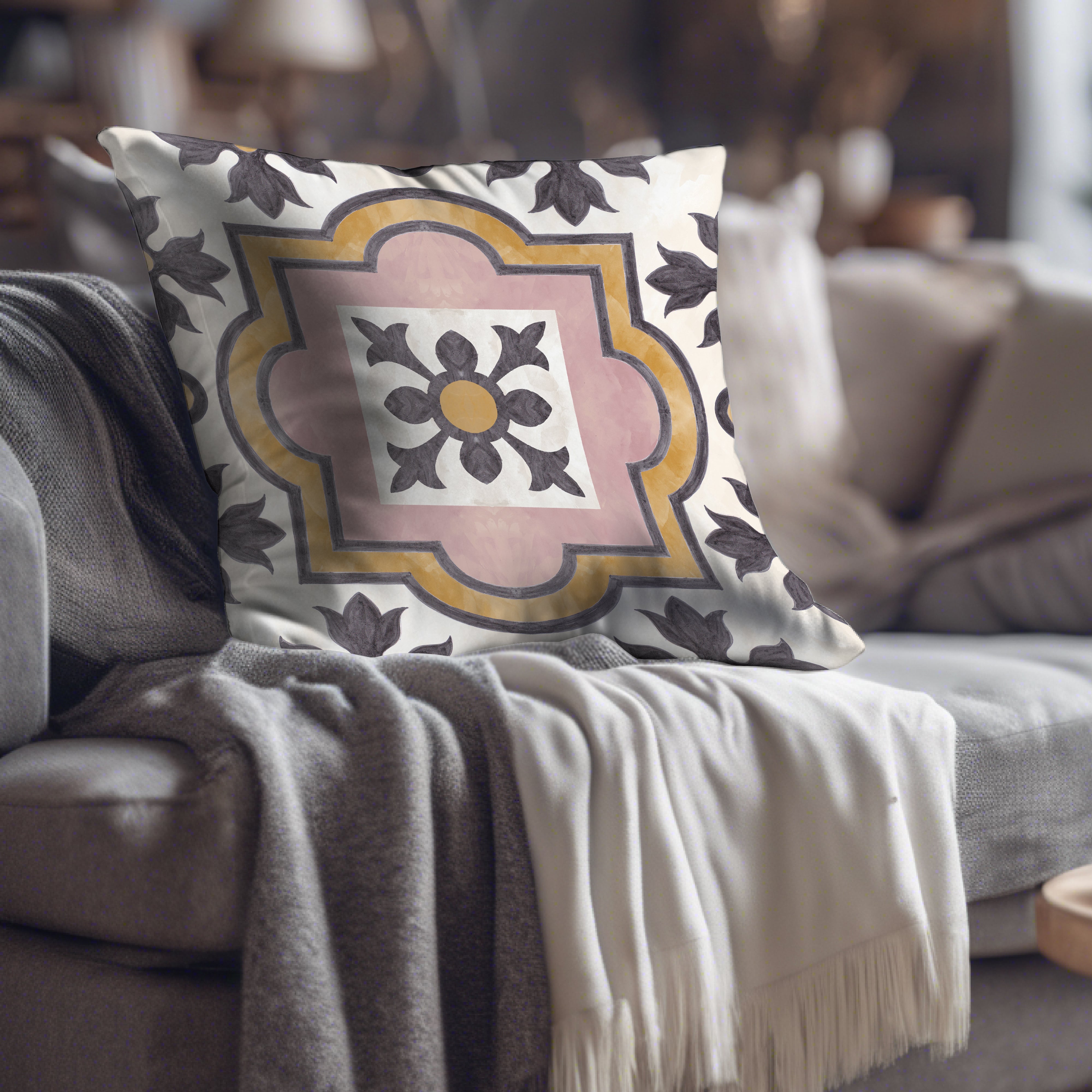 a decorative pillow on a couch in a living room