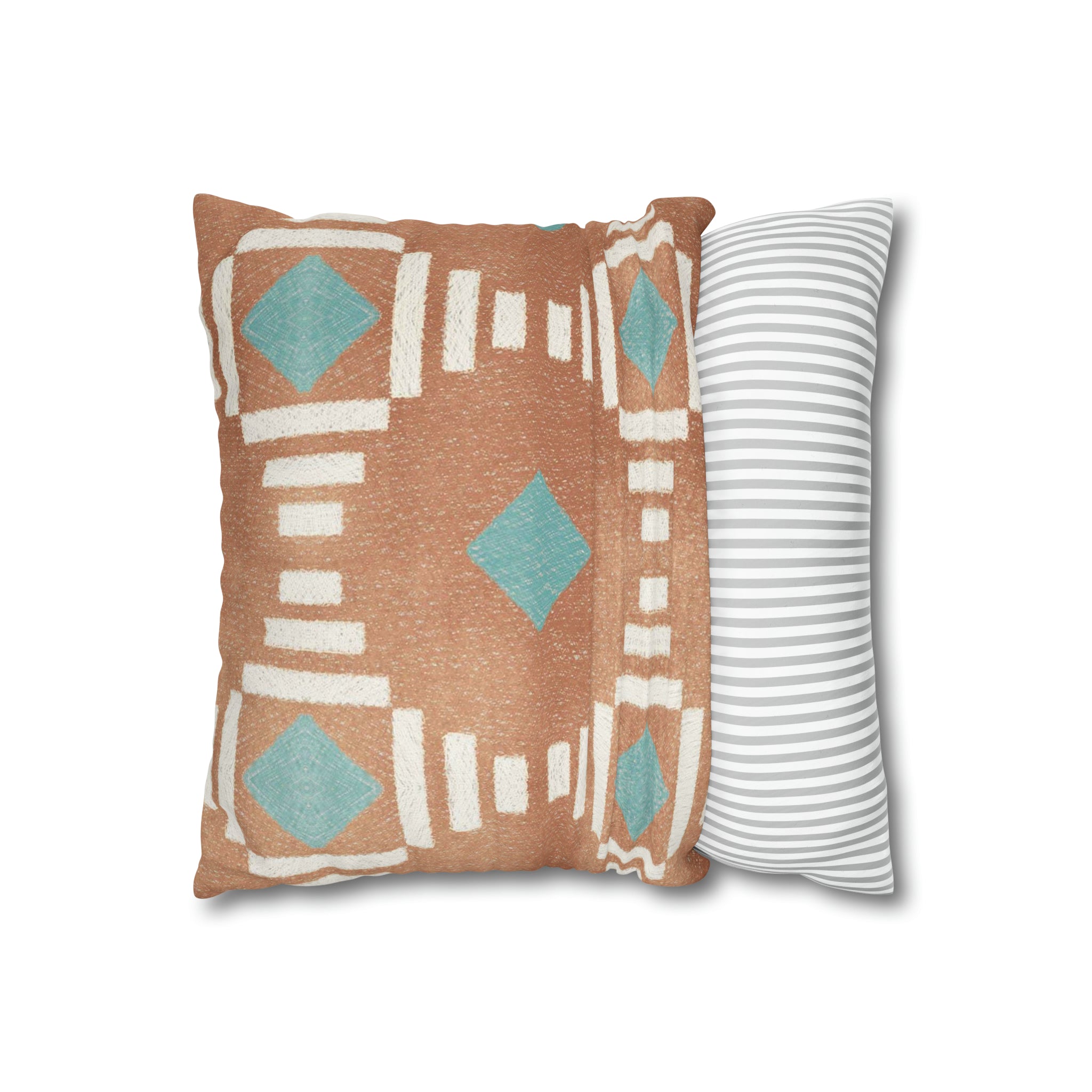 a pair of decorative pillows on a white background